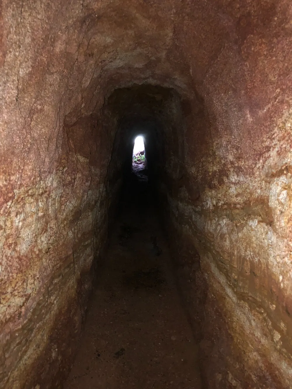 Artisanal tunnel within weathered rock at Novo Cruzeiro.