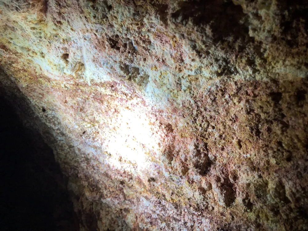 Pink saprolite with tourmaline and biotite traces