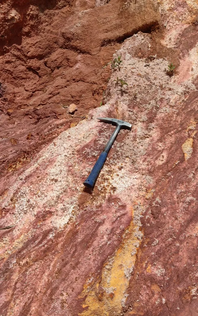 Whitened granitic saprolite with feldspar weathering